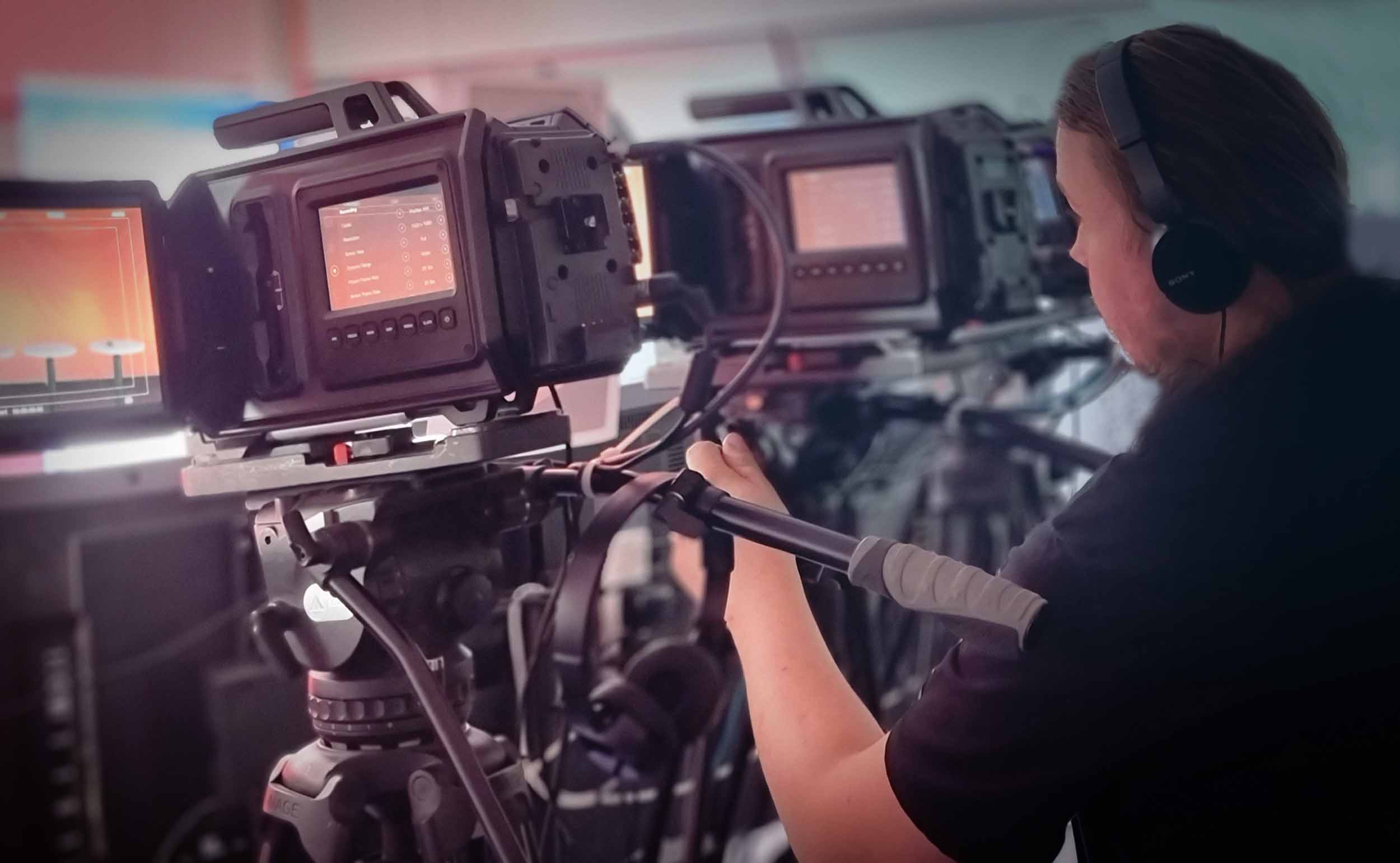 Concept LIVE camera operator at a sports live streaming event